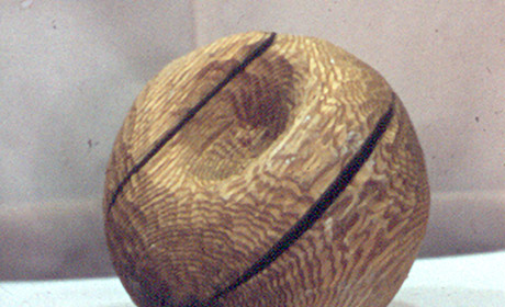 Carved wooden sphere